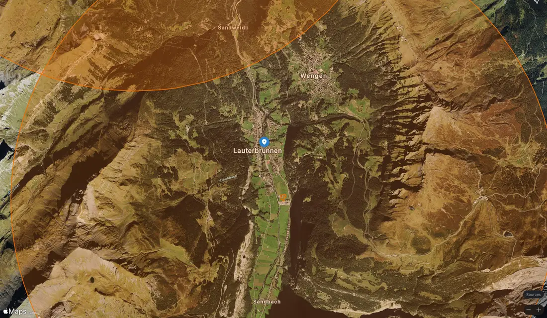 Satellite view of the Lauterbrunnen valley with the heliport zone drawn over it